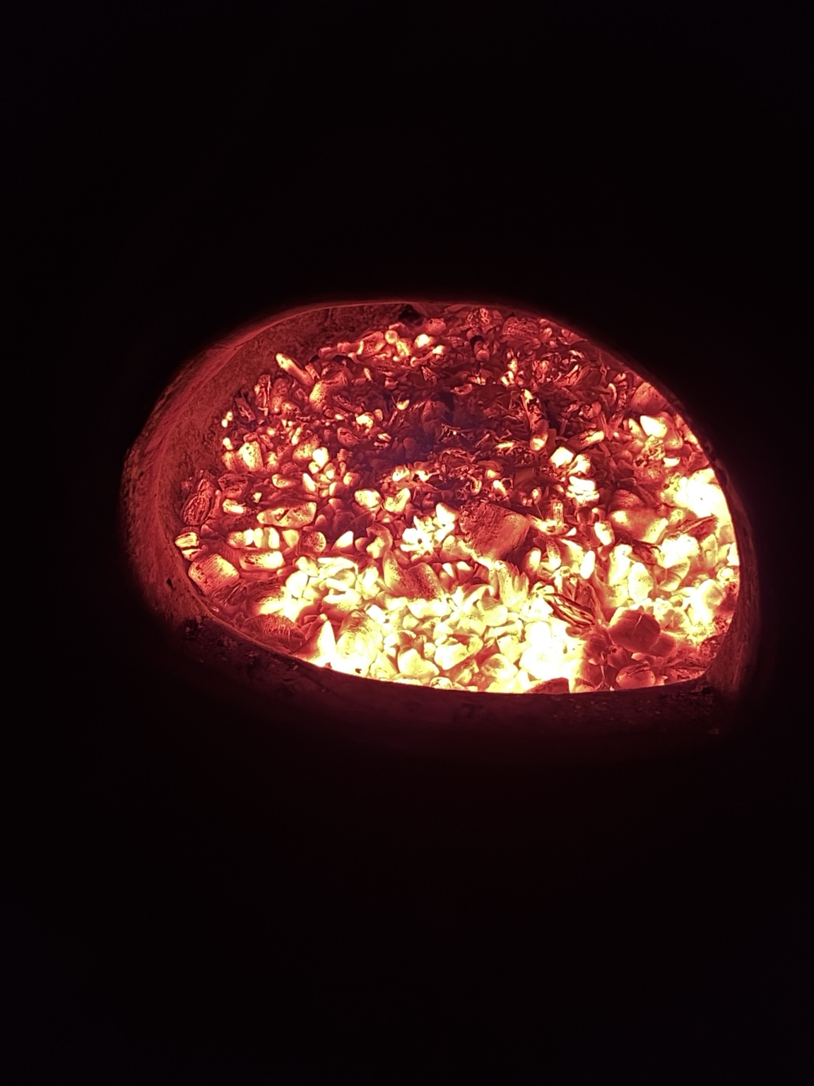 Glowing embers in darkness